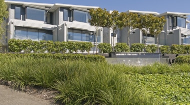 The Moorings in Taupo by Haimes Building townhouses estate, grass, grass family, home, house, plant, property, real estate, residential area, brown
