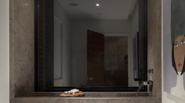 This is a home that was designed by bathroom, floor, interior design, room, gray, black