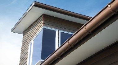 View of new spouting. - View of new architecture, building, daylighting, facade, house, rain gutter, roof, siding, sky, window