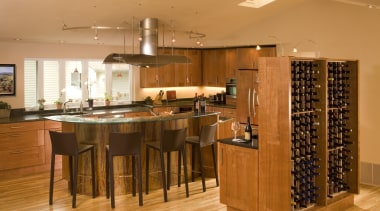 A view of a kitchen designed by Richard cabinetry, countertop, dining room, floor, flooring, hardwood, interior design, kitchen, laminate flooring, room, wood, wood flooring, orange, brown