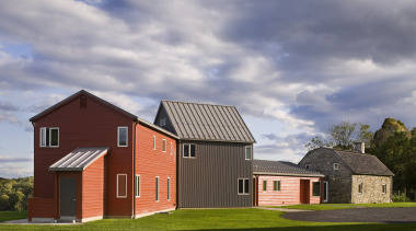 Architect Alexander Gorlin distilled the essence of a architecture, barn, building, cottage, elevation, estate, facade, farmhouse, home, house, property, real estate, residential area, roof, shed, sky, gray