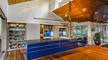 In this large family kitchen, retractable doors open ceiling, interior design, real estate, wood, brown, gray