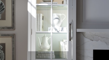 A close up view of kitchen cabinetry from cabinetry, display case, door, furniture, home, interior design, room, sash window, shelf, shelving, wall, window, gray