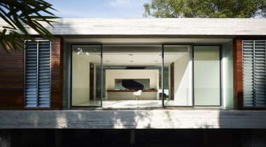 This low-lying, high-end house is by Ong Singapore architecture, facade, home, house, real estate, siding, window, black