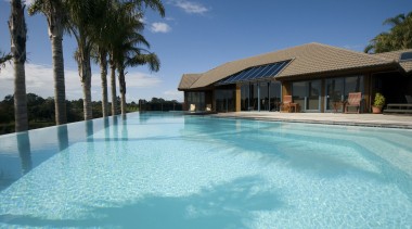 Sun, swimming, exercise and all the vitality that caribbean, estate, home, house, lagoon, leisure, leisure centre, property, real estate, resort, resort town, sky, swimming pool, vacation, villa, water, teal