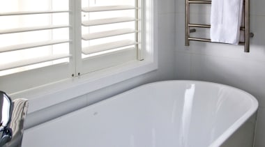 Soft neutrals and whites feature in the living bathroom, bathtub, floor, interior design, plumbing fixture, property, room, tap, window, gray