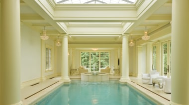 This pavilion-style indoor pool is flooded with natural ceiling, column, daylighting, estate, home, interior design, lobby, property, real estate, structure, swimming pool, thermae, window, orange