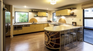 Nicola Cumming Design black and butterscotch kitchen countertop, cuisine classique, estate, floor, flooring, hardwood, interior design, kitchen, real estate, room, wood, wood flooring, brown, orange