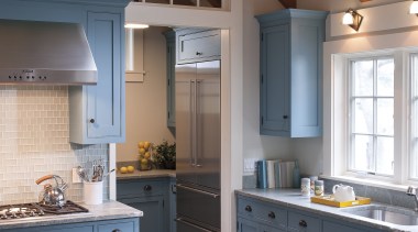 Interior designer Elizabeth Swartz has repurposed a rear cabinetry, ceiling, countertop, cuisine classique, daylighting, home, interior design, kitchen, real estate, room, gray