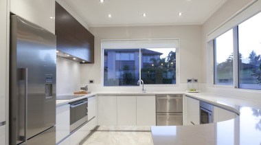 This sleek family kitchen is by Superior Kitchens countertop, estate, house, interior design, kitchen, property, real estate, window, gray