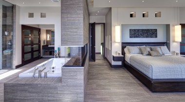 This master suite has been opened up to floor, flooring, interior design, living room, wood flooring, gray