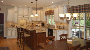 Remodeling this kitchen has given it a stronger cabinetry, countertop, cuisine classique, dining room, flooring, home, interior design, kitchen, real estate, room, wood, brown, orange