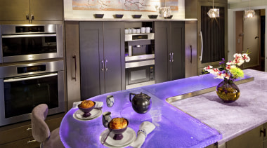 Glass countertops illuminated with violet lighting ensure this countertop, home appliance, interior design, kitchen, room
