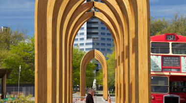 The Arcades is a collaboration between Ryan Reynolds, arch, architecture, sky, structure, wood, gray