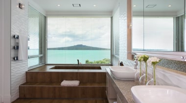 Like an eyrie high above the clifftop, this bathroom, estate, home, interior design, real estate, room, window, window covering, gray, white