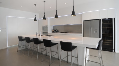 Clean lined and crips.  this kitchens monochromatic architecture, countertop, floor, flooring, furniture, interior design, kitchen, product design, real estate, table, gray