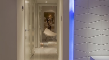 Architects own Mid-century Modern apartment with white interiors architecture, ceiling, door, floor, flooring, home, interior design, lighting, lobby, wall, brown, gray