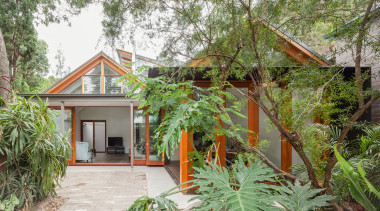 Shoehorned into a laneway on a tight site, cottage, home, house, plant, property, real estate, tree, green