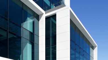 Watercare House in Newmarket boasts a strong street architecture, building, commercial building, corporate headquarters, daytime, elevation, facade, headquarters, metropolitan area, mixed use, sky, structure, blue