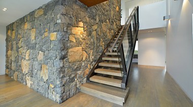 Eighteen hand-applied stains are available, offering a broad floor, flooring, handrail, interior design, stairs, wall, gray