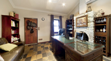 This renovated cottage has become a home office. countertop, estate, home, interior design, kitchen, property, real estate, room, gray, brown