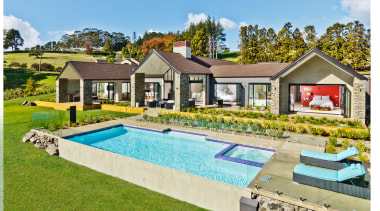 The pavilion-style design of this house means the cottage, estate, home, house, leisure, property, real estate, resort, swimming pool, villa