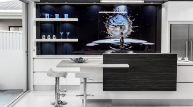 This kitchen incorporates a large backpainted splashback featuring furniture, interior design, product design, white, black