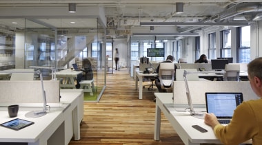Ceilings and exposed mechanical services were painted white office, gray