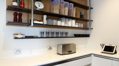 This scullery is an extension of a award-winning cabinetry, furniture, interior design, kitchen, shelf, shelving, white