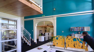 The project, designed by architect Ian Butcher, included architecture, interior design, teal