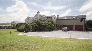 This new country home designed by Don Nelson cottage, estate, facade, grass, home, house, land lot, landscape, lawn, property, real estate, residential area, suburb, white