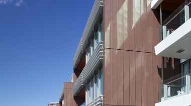 Pre-weathered Pigmento Brown VM Zinc was supplied by apartment, architecture, building, condominium, facade, house, mixed use, real estate, residential area, sky, blue, gray