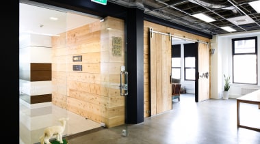 The meeting room, beside the entry to EightyOne, floor, flooring, interior design, white, black