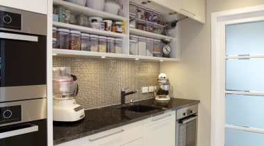 A place for everything and everything in its cabinetry, countertop, cuisine classique, home appliance, interior design, kitchen, real estate, room, gray