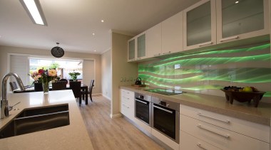 The subtle tones in this kitchen are the ceiling, countertop, interior design, kitchen, room, brown, gray