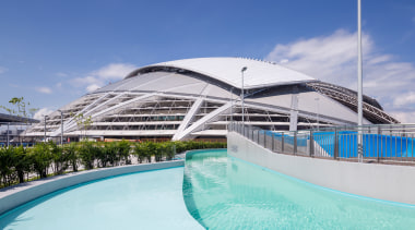 Public amenities at the Singapore Sports Hub include architecture, leisure, resort, sea, sky, swimming pool, vacation, water, blue, teal