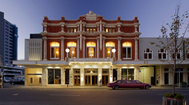The Isaac Theatre Royal in Christchurch has undergone architecture, building, city, classical architecture, commercial building, downtown, elevation, estate, facade, home, hotel, house, landmark, mansion, metropolis, metropolitan area, mixed use, neighbourhood, plaza, real estate, residential area, sky, town, blue