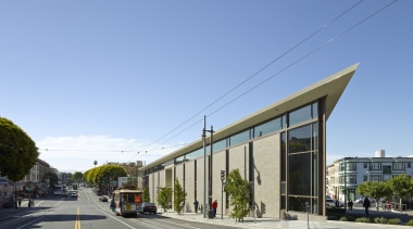 Cable cars travel up Columbus Avenue in San architecture, building, commercial building, condominium, corporate headquarters, house, metropolitan area, mixed use, neighbourhood, real estate, residential area, sky, teal