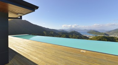 This 25m x 6m swimming pool was built architecture, daylighting, estate, floor, home, house, property, real estate, roof, sky, swimming pool, villa, water, wood, teal