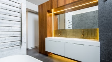 The white floating vanity is underlit, adding to architecture, bathroom, interior design, room, wall, white