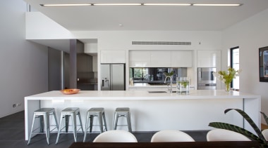 A 5m-long island with a Caesarstone top and architecture, countertop, house, interior design, kitchen, real estate, table, gray