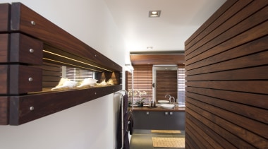 Timber slats stained in Resene Colorwood Mahogany bring architecture, ceiling, interior design, real estate, wood, gray