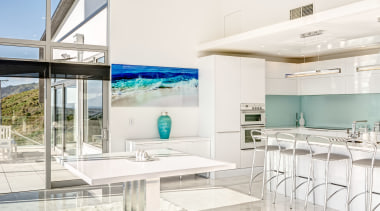 Glass and white surfaces predominate in this European-style architecture, house, interior design, real estate, white