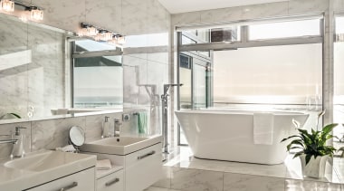 Soaking up the scenery  the bathtub arguably bathroom, interior design, sink, gray