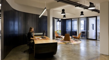 In this fit-out at Tanner Kibble Denton Architectss floor, flooring, furniture, interior design, loft, office, table, brown, black, gray