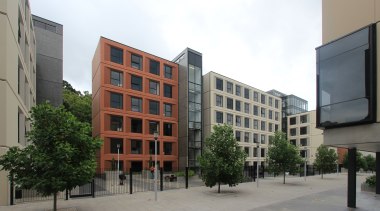 Custom concrete panels by Nauhria create a sense apartment, architecture, building, city, commercial building, condominium, corporate headquarters, downtown, facade, house, metropolitan area, mixed use, neighbourhood, real estate, residential area, urban area, urban design, window, gray, white