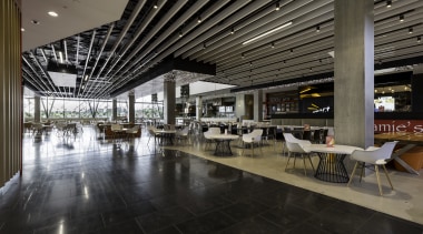 A state-of-the-art food hall is at the heart food court, interior design, lobby, black, gray