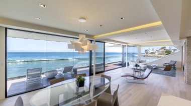 A wall of glass provides dramatic ocean views apartment, architecture, ceiling, condominium, estate, home, house, interior design, living room, penthouse apartment, property, real estate, window, gray