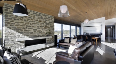 With glazing on three sides, this homes generous architecture, ceiling, house, interior design, living room, loft, real estate, brown, black