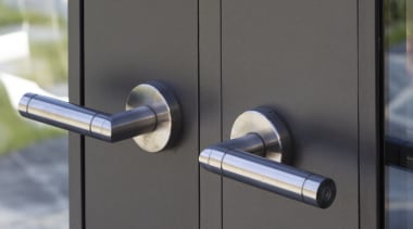 Handles for this Millbrook Resort home were custom-made door, lock, gray